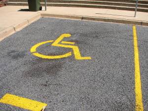 Handicapped parking fraud is a serious crime in California. 800px-Disabled_parking_place