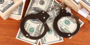 money handcuffs bank